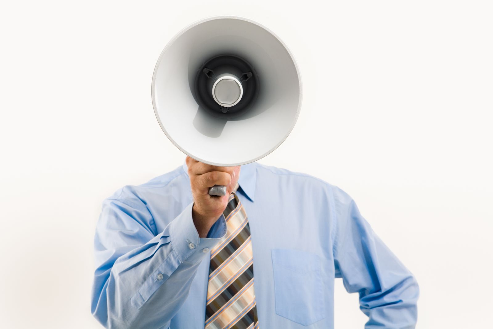A businessman holding a megaphone, symbolizing a broadcast reaching everyone at once.